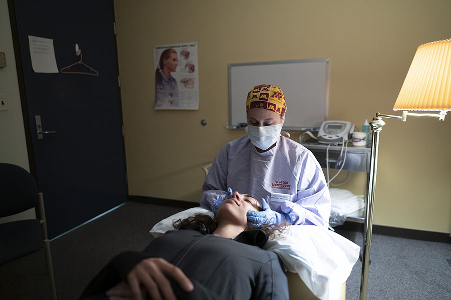 TMD patient receiving care from a faculty member